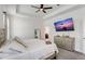 Spacious main bedroom with king-size bed and ensuite bathroom at 1767 Bee Nice Dr, Kissimmee, FL 34744