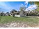 Newly painted house with a carport and yard at 718 Kensington St, Eustis, FL 32726