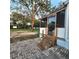 Home exterior showcasing a screened porch and yard at 4427 Dove Meadow Ln, Lakeland, FL 33810