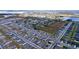 Aerial view of a large residential community with various housing styles and a lake at 4407 Rapallo Ave, Winter Haven, FL 33884