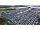 Aerial view of a large residential community with various housing styles and waterways at 4407 Rapallo Ave, Winter Haven, FL 33884