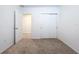 Bedroom with carpet flooring and double door closet at 4407 Rapallo Ave, Winter Haven, FL 33884