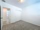 Bedroom with carpet flooring and double door closet at 4407 Rapallo Ave, Winter Haven, FL 33884
