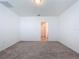 Spacious bedroom with carpet and access to bathroom at 4407 Rapallo Ave, Winter Haven, FL 33884