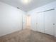 Bedroom with carpet flooring and double door closet at 4407 Rapallo Ave, Winter Haven, FL 33884