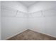 Bright walk-in closet with wire shelving at 4407 Rapallo Ave, Winter Haven, FL 33884