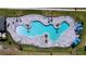 Aerial view of a community pool with a unique design at 4407 Rapallo Ave, Winter Haven, FL 33884