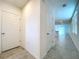 Bright entry hall with tile flooring and access to other rooms at 4407 Rapallo Ave, Winter Haven, FL 33884