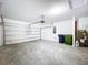 Attached garage with ample space and concrete flooring at 4407 Rapallo Ave, Winter Haven, FL 33884