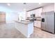 Modern kitchen with stainless steel appliances and granite countertops at 4407 Rapallo Ave, Winter Haven, FL 33884