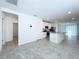 Modern kitchen featuring stainless steel appliances and an island at 4407 Rapallo Ave, Winter Haven, FL 33884