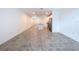 Open living area with tile floors and kitchen island view at 4407 Rapallo Ave, Winter Haven, FL 33884