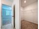 Large walk-in closet with wire shelving and neutral carpeting at 4407 Rapallo Ave, Winter Haven, FL 33884