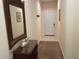 Welcoming entryway with a wicker console table and a view of the front door at 409 Lucaya Loop # 409, Davenport, FL 33897
