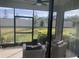 Relaxing screened porch overlooking the backyard at 1263 Verdant Glade Pl, Winter Park, FL 32792