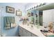 Light blue bathroom with a single vanity and shower at 1694 Town Park Dr, Port Orange, FL 32129