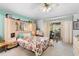 Bedroom with ensuite bathroom and access to a patio at 1694 Town Park Dr, Port Orange, FL 32129