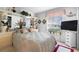 Comfortable bedroom with a queen-size bed and built-in shelving at 1694 Town Park Dr, Port Orange, FL 32129