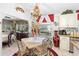 Kitchen features a breakfast nook and updated cabinetry at 1694 Town Park Dr, Port Orange, FL 32129