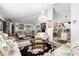Spacious living room with a chandelier and access to the kitchen at 1694 Town Park Dr, Port Orange, FL 32129