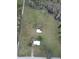 Aerial view of property with two buildings and large land at 4915 Mount Pleasant Rd, Groveland, FL 34736