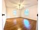 Bright bedroom with wood flooring and ceiling fan at 4915 Mount Pleasant Rd, Groveland, FL 34736