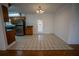Bright dining area with tile flooring and access to backyard at 4915 Mount Pleasant Rd, Groveland, FL 34736