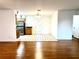 Combined kitchen and dining area with wood floors at 4915 Mount Pleasant Rd, Groveland, FL 34736