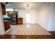 Bright dining area with tile floors and access to the kitchen at 4915 Mount Pleasant Rd, Groveland, FL 34736