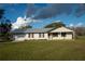 Ranch-style home with metal roof and spacious yard at 4915 Mount Pleasant Rd, Groveland, FL 34736