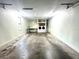 Spacious garage with ample storage and workshop area at 4915 Mount Pleasant Rd, Groveland, FL 34736