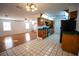 Open kitchen with wood cabinets and stainless steel appliances at 4915 Mount Pleasant Rd, Groveland, FL 34736