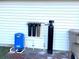 Exterior water filtration system with multiple filter stages at 4915 Mount Pleasant Rd, Groveland, FL 34736