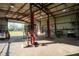 Large workshop with vehicle lift and various tools at 4915 Mount Pleasant Rd, Groveland, FL 34736