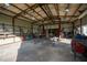 Spacious workshop, well-lit with various tools and equipment at 4915 Mount Pleasant Rd, Groveland, FL 34736
