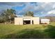 Detached workshop with roll-up door and ample space at 4915 Mount Pleasant Rd, Groveland, FL 34736
