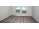 Spacious bedroom with carpeted floor and large windows at 1106 Foreshore Ln, Haines City, FL 33844