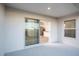 Covered patio with sliding glass doors leading to living room at 1106 Foreshore Ln, Haines City, FL 33844