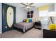 Surf-themed bedroom with a bed and surfboard decor at 5657 Meditation Dr, Clermont, FL 34714