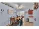 Bright dining area with a wooden table and chairs at 136 Cory Ct, Auburndale, FL 33823