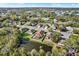 Aerial view of house and neighborhood, showcasing the community and surrounding landscape at 1771 Turtle Rock Dr, Lakeland, FL 33803