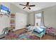 Charming ' bedroom with playful decor and twin beds at 1771 Turtle Rock Dr, Lakeland, FL 33803