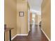Bright and spacious entryway with hardwood floors and view to the living room at 1771 Turtle Rock Dr, Lakeland, FL 33803