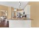 Kitchen features granite countertop and white cabinets at 1771 Turtle Rock Dr, Lakeland, FL 33803