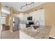 Updated kitchen featuring stainless steel appliances and granite countertops at 1771 Turtle Rock Dr, Lakeland, FL 33803