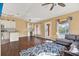 Open floor plan with kitchen, living room, and access to patio at 1771 Turtle Rock Dr, Lakeland, FL 33803