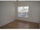 Bright bedroom with tile floors and window blinds at 4340 S Kirkman Rd # 905, Orlando, FL 32811