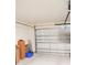 Spacious two-car garage with ample storage space at 4694 Sigcom Pl, Wildwood, FL 34785