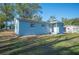 Spacious backyard with side view of house at 1721 Bayview Dr, Lakeland, FL 33805