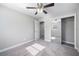 Bright bedroom with plush carpet and mirrored closet doors at 1721 Bayview Dr, Lakeland, FL 33805